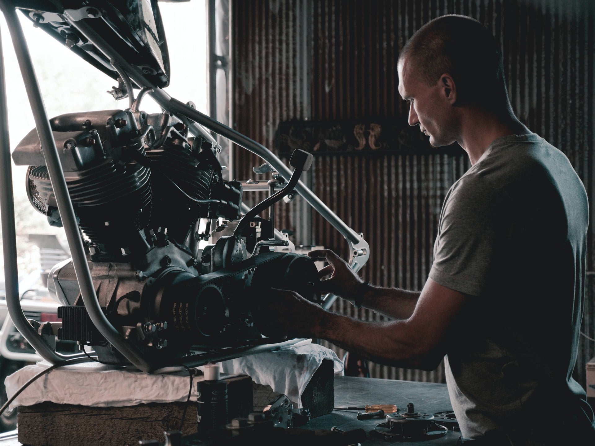 What are the most common hazards present in an automotive workshop?